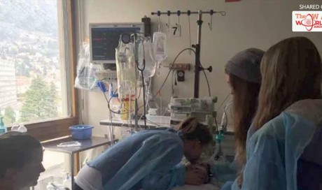 Final kiss goodbye before daughter's organs are removed after fatal ski crash