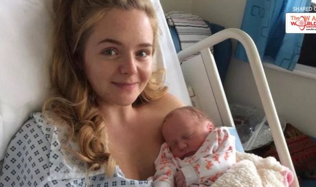 Mum shocked giving birth to boy after four scans confirm 'baby girl' 
