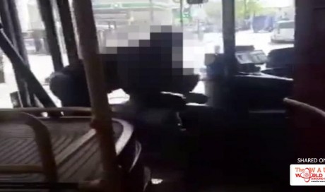 Shocking moment man brandishing a huge KNIFE storms London bus before being wrestled by have-a-go hero who saves the day