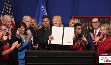 Trump signs order that may hit foreign workers