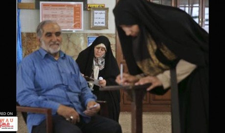 Iran votes in verdict on Rouhani’s economy
