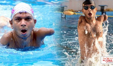 No arms? No problem. How this young man turned tragedy into triumph and became a swimming champion