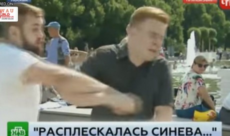 Look! Russian TV reporter punched in the face by a drunk man during live broadcast