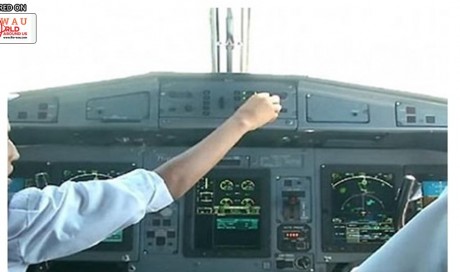 Two pilots let 10-year-old boy take control of plane, gets suspended