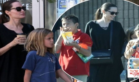 Angelina Jolie is all smiles as she treats kids to lunch and round of laser tag during energetic day out without Brad Pitt