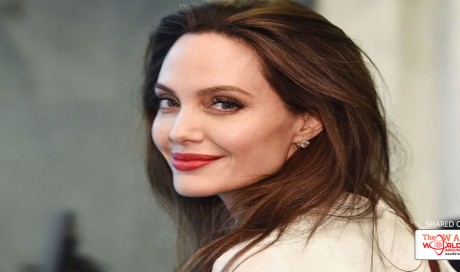 Angelina Jolie poses in Africa for Harper’s Bazaar