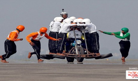 58 men cram onto motorcycle in India to break world record