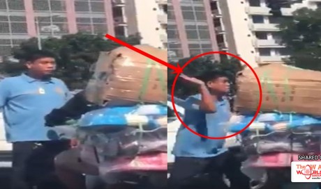 Policeman Who Slaps Motorist Along The Street Caught On Camera