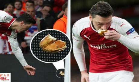 Why Mesut Özil kissed bread thrown at him by fan
