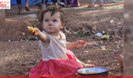 Refugee Toddler Offers Food To A Journalist Who Came To Take A Picture Of Her