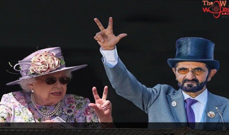 Is the Queen doing Dubai’s 3-finger salute?
