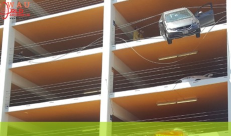 Car Hangs From 4th Floor Parking. Driver Hit Accelerator By Mistake
