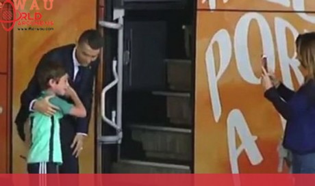 Cristiano Ronaldo Jumps Off Team Bus To Hug A Crying Young Fan, Poses For Photo With The Kid