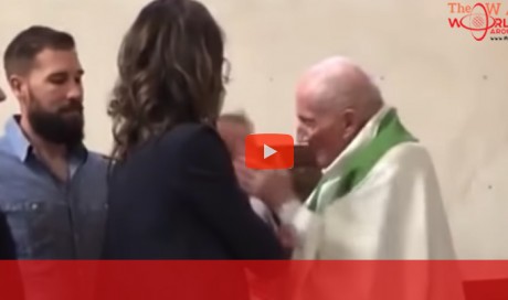 French priest suspended after slapping baby during baptism
