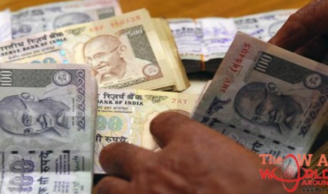 Indian rupee falls to a record low against the dollar
