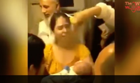VIDEO: Mother cries for help to save infant inside suffocated PIA plane