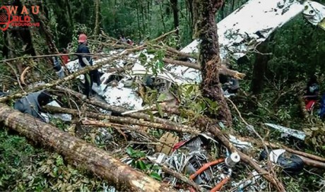 12-year-old boy survives Indonesia plane crash, eight bodies found