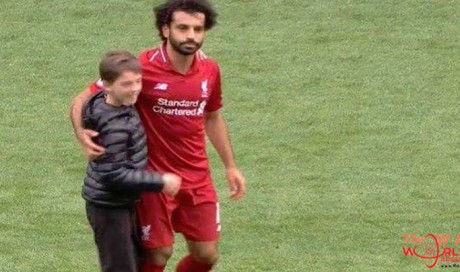  Young boy invades pitch and gets a hug from Mo Salah: Video
