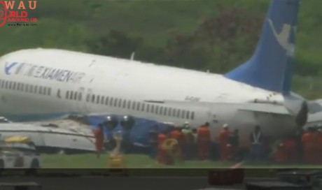 Chinese plane slides off Manila airport runway in heavy rain