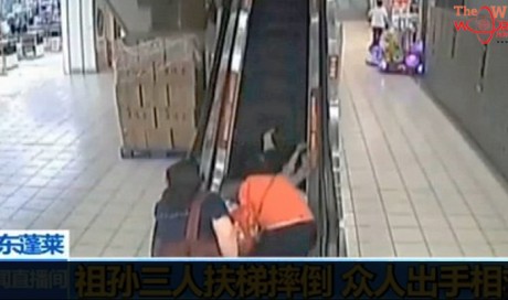 Woman tumbles down escalator with two grandchildren