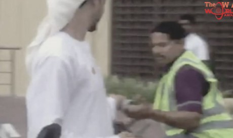 
Police probe men caught giving away cash to strangers in Dubai