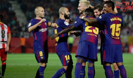 Pique rescues 10-man Barca to draw with Girona
