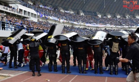 Indonesia's top football league suspended after fan dies