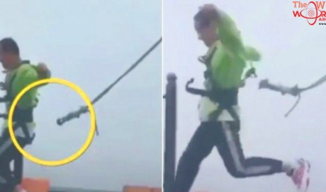 Chinese Man Narrowly Escapes After Safety Cord Snaps On 500-Foot Bridge, Theme Park Shuts Down