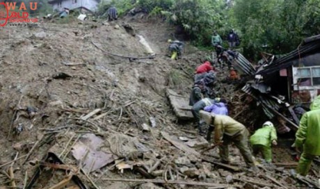 Philippines races to free 30 trapped in typhoon landslide