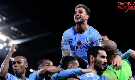 Manchester City beat Manchester United  to move top of Premier League