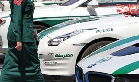 Auto workshop employee kisses Dubai woman cop