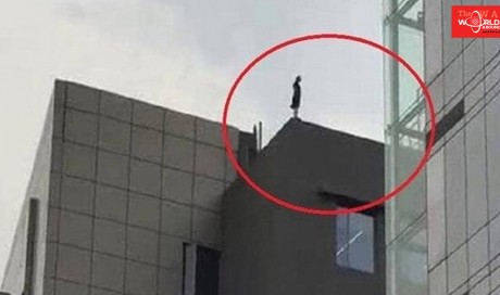 Video: Indian woman threatens to jump off five-storey building for being fired