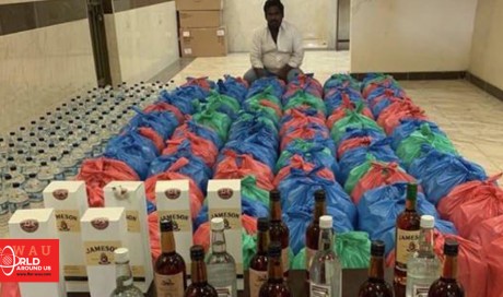 Securitymen nab Asian with 1,200 bottles of local and foreign liquor