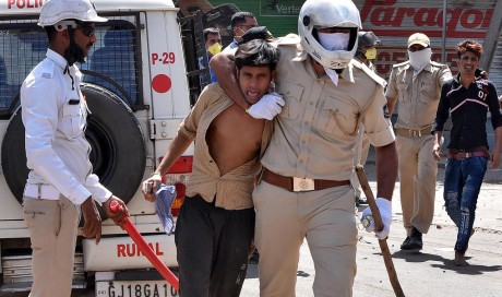 Police clash with crowds as India eases coronavirus curbs