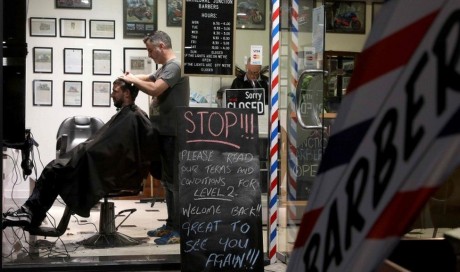 Coronavirus: New Zealand reopens with midnight barbers queues
