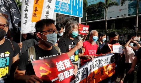 Hong Kong marks handover anniversary as national security law takes effect