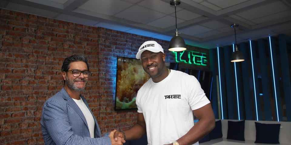  Nvdcc Andre Russell signs on as brand ambassador for UK tech company